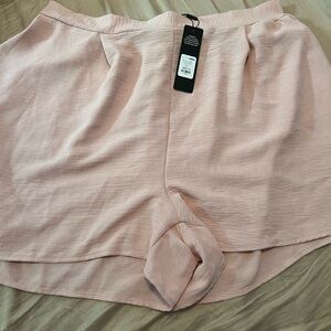 Blush pink linen shorts